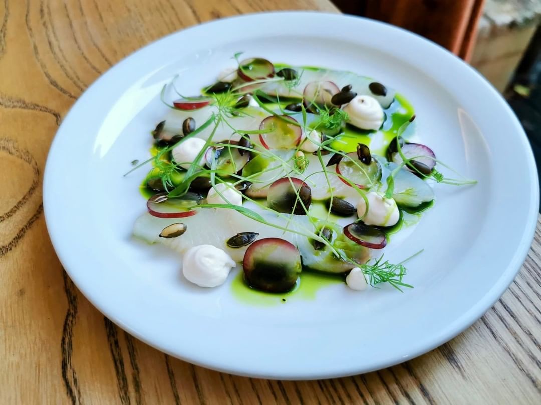 Vodka cured halibut, grapes, sour cream, pea shoots and pumpkin seeds. Such pure and fresh flavours. And ones of the prettiest dishes to leave the kitchen.